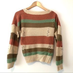 ** Cozy warm colored Striped distressed sweater